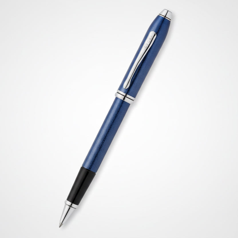 Blue pen with silver accents on a white background