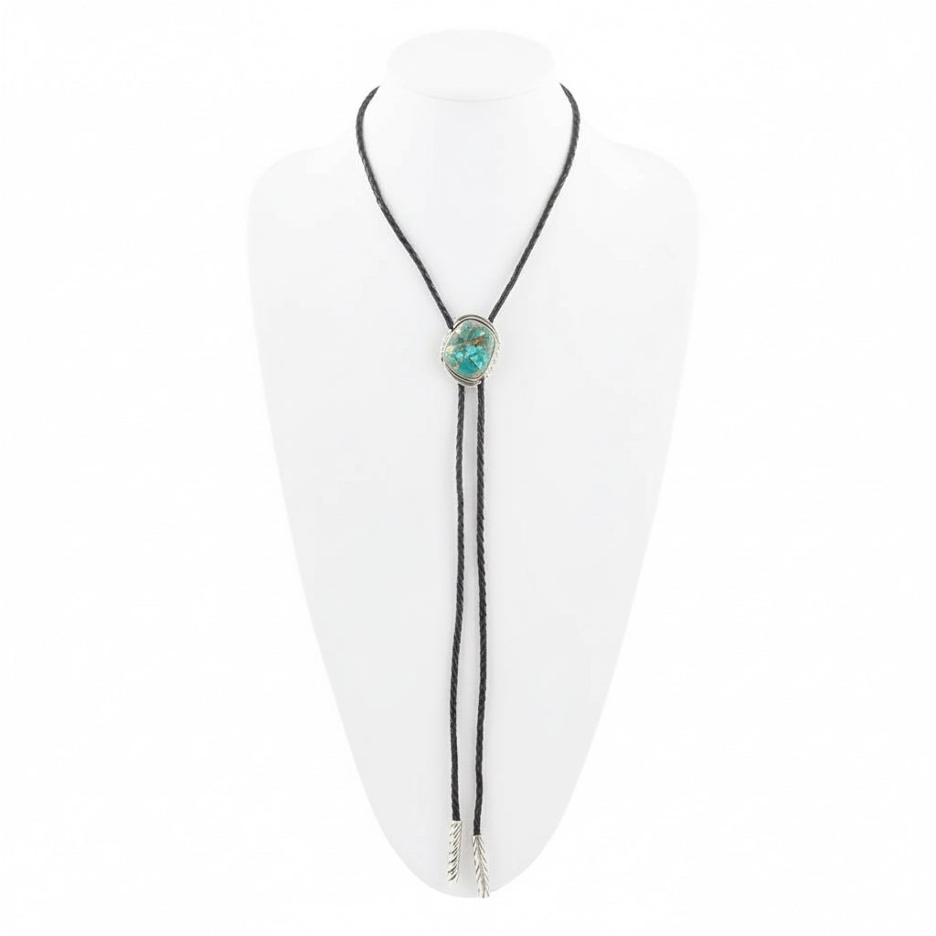Blue green turquoise bolo pendant on a black leather blouse tie